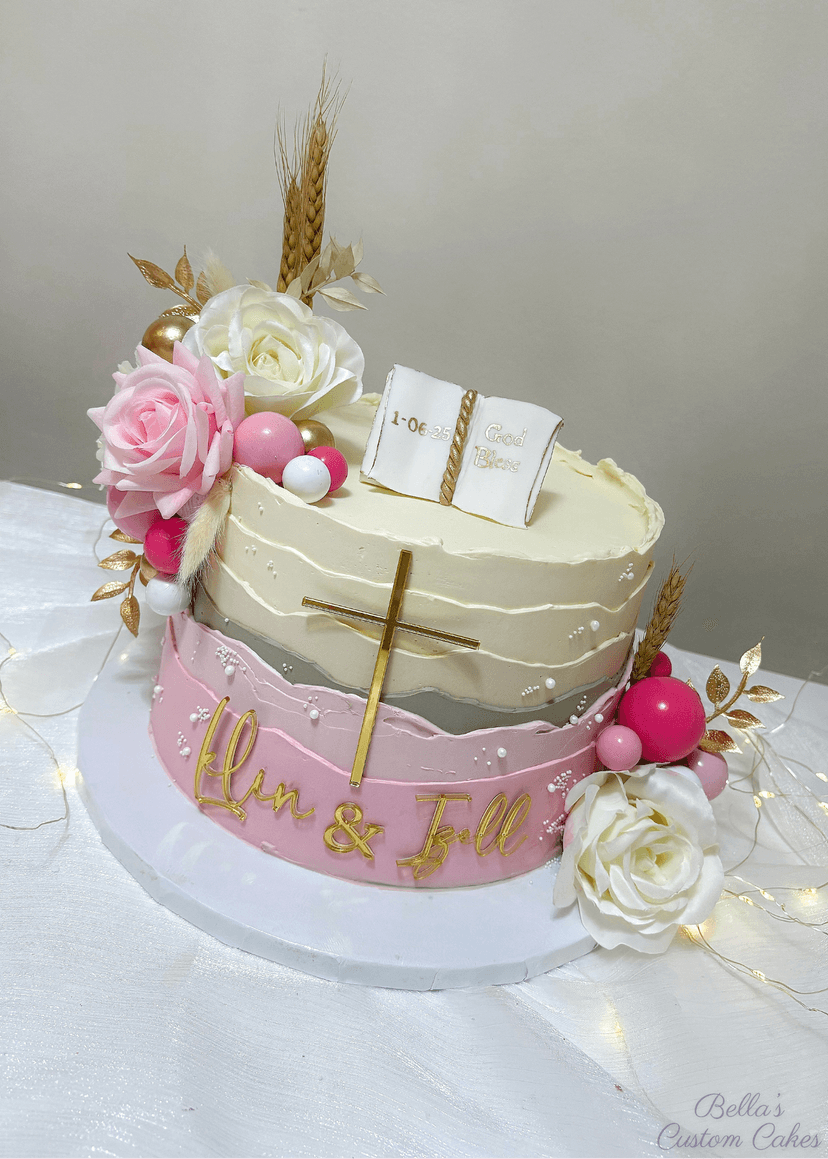 Elegant white First Holy Communion cake with delicate floral decorations