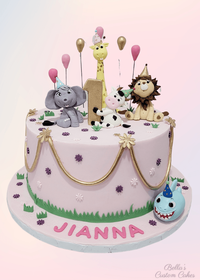 Farm animal cake featuring a cute barnyard scene with a wild animals