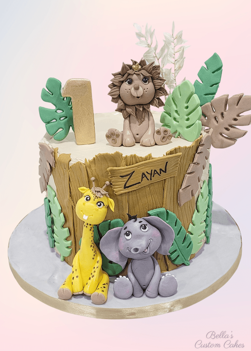Cute cake decorated with lion and elephant