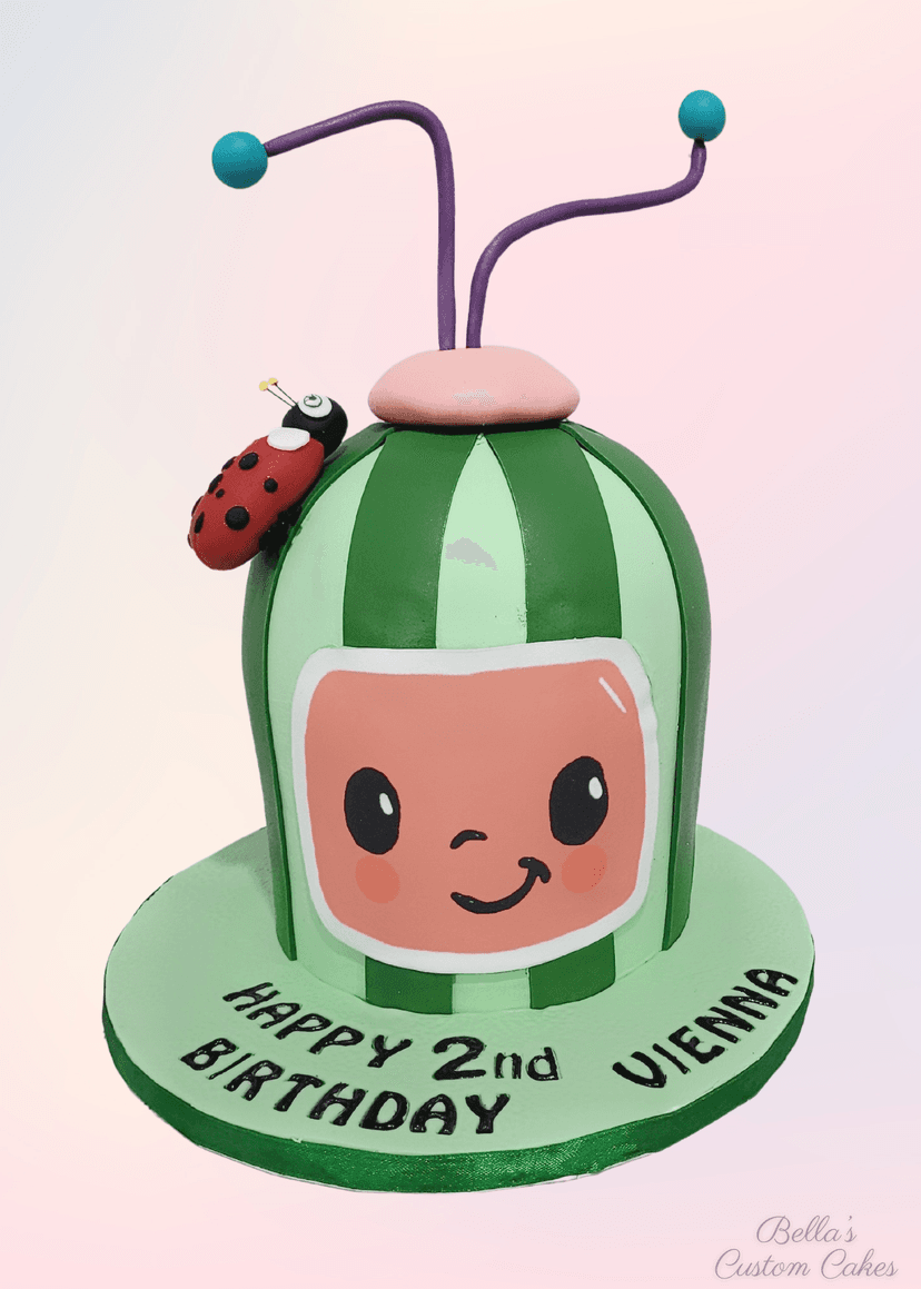 Cheerful Cocomelon cake with a musical theme and character illustrations