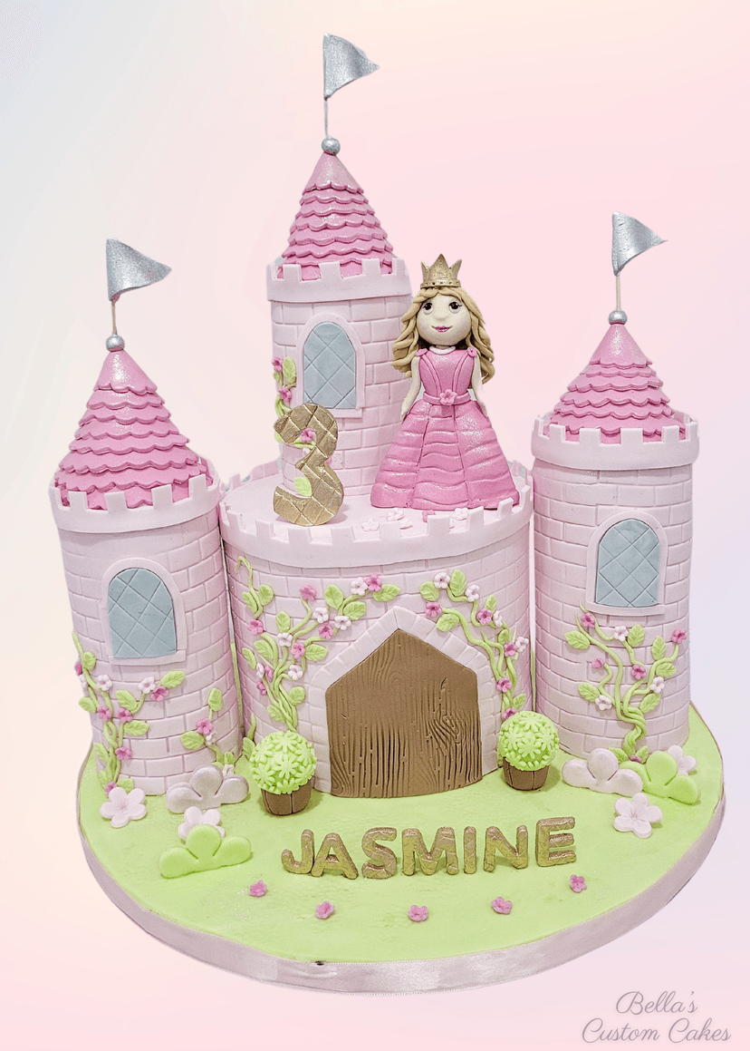 Princess-themed cake with castle and fairy tale decorations