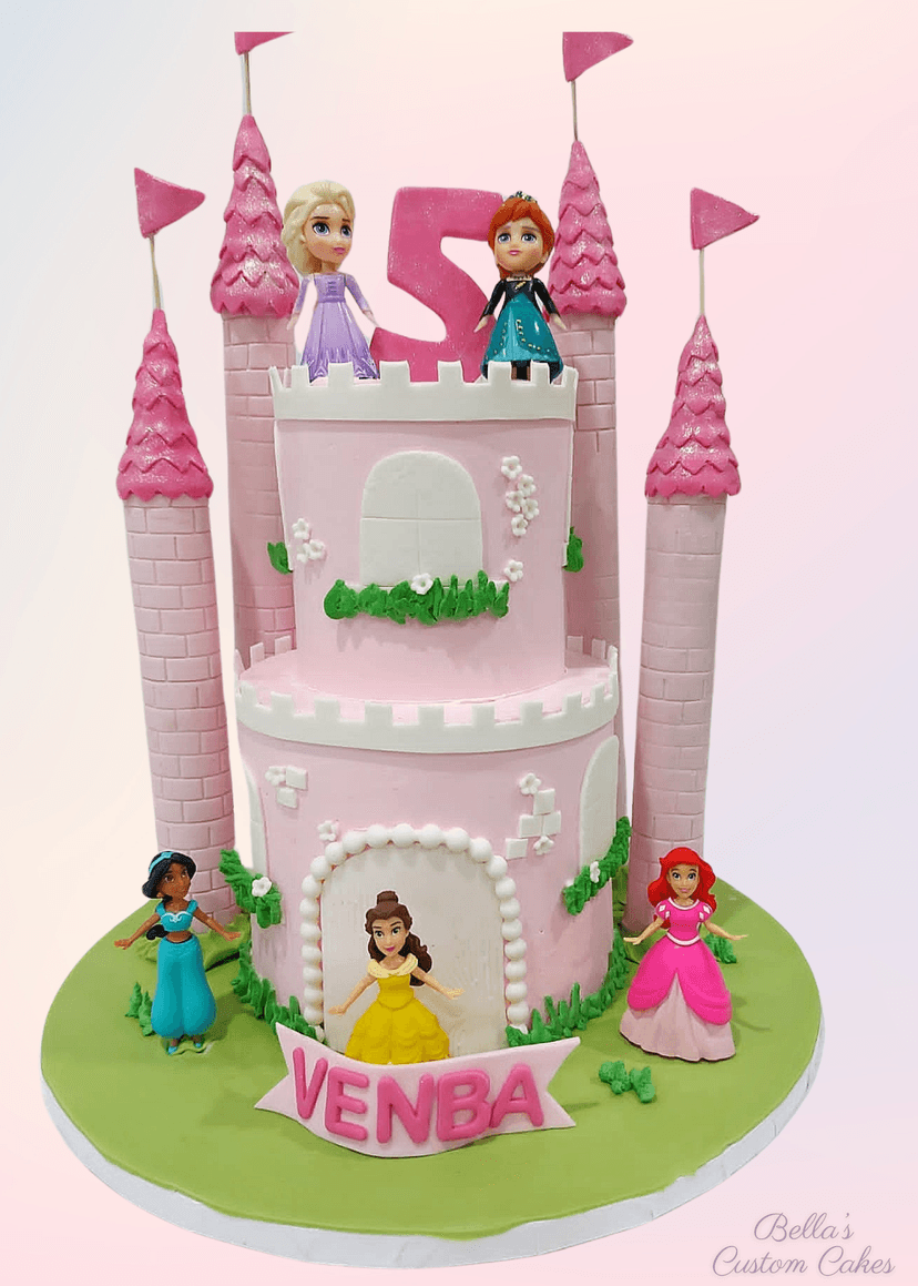Disney-themed birthday cake with colorful two-tier castle