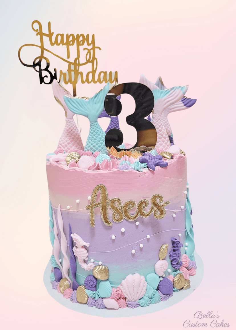 Mermaid-themed cake with shimmering scales and sea shells