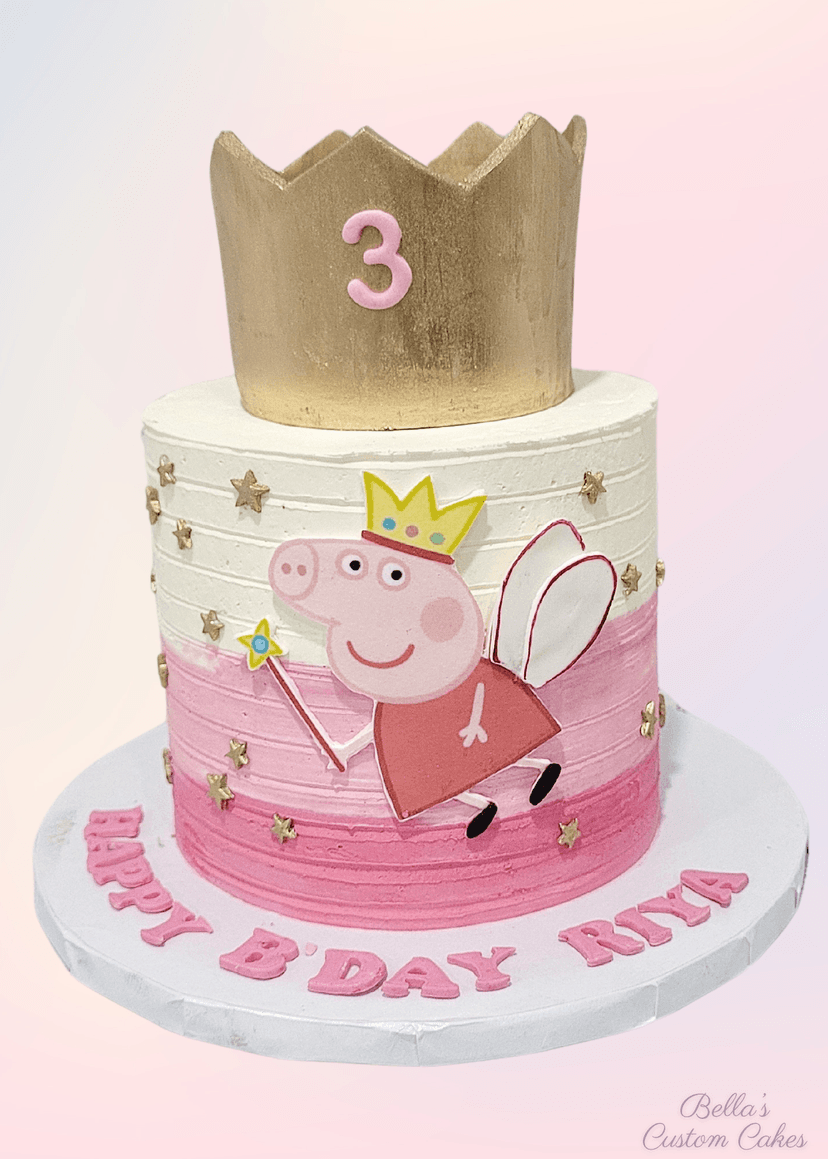 Bright and cheerful Peppa Pig cake with crown fondant details