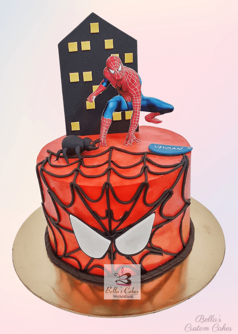 Bold spiderman cake with red and blue colors and comic book style design